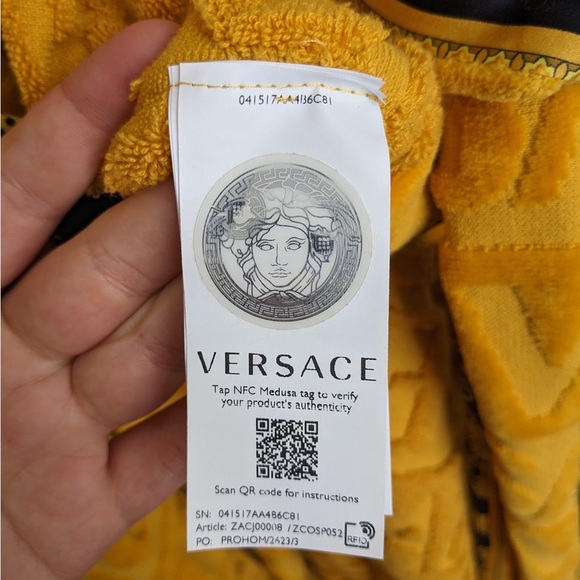 genuine Versace gold robe with box.
Barely worn, retails for $725 - Picture 3 of 5